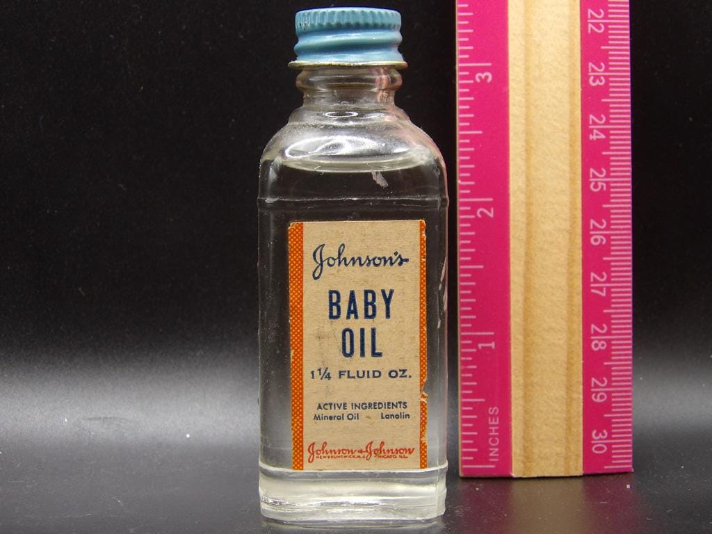 Vintage Johnson & Johnson Baby Oil Glass Bottle — 1¼ fl oz with Blue Metal Cap