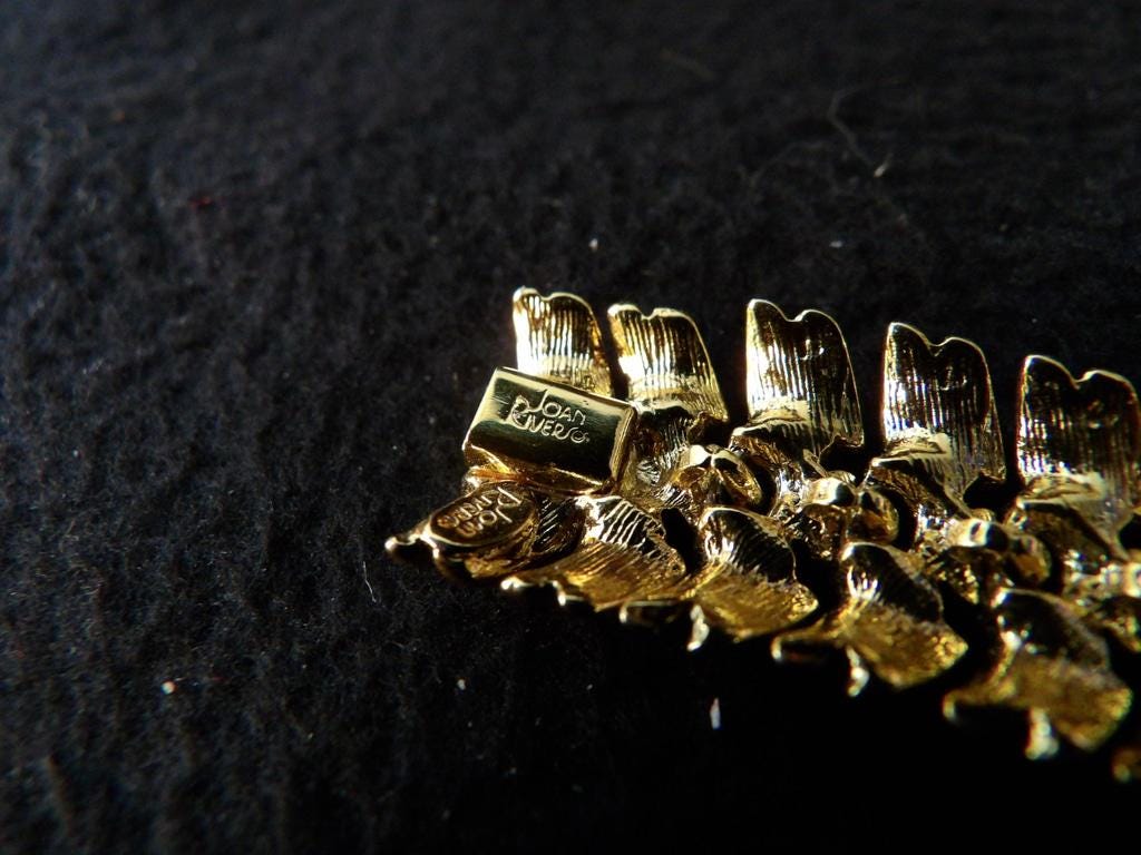 Joan Rivers Gold Tone Triple Row Clear Rhinestone Bracelet with Logo Clasp
