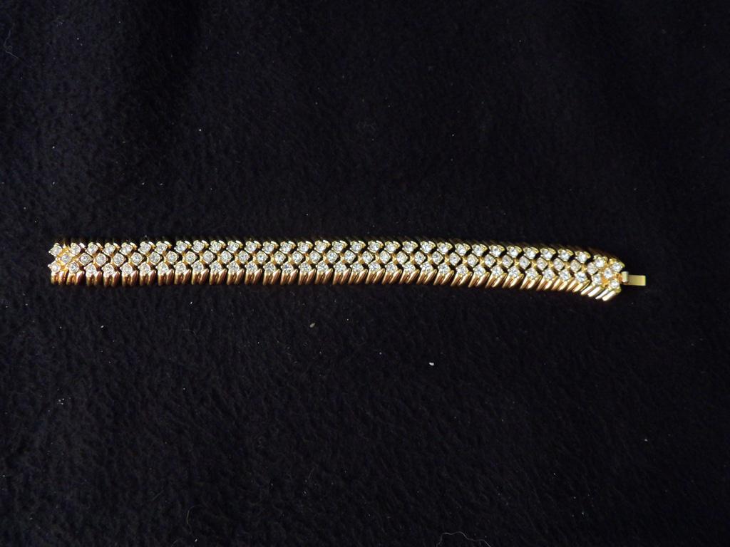 Joan Rivers Gold Tone Triple Row Clear Rhinestone Bracelet with Logo Clasp