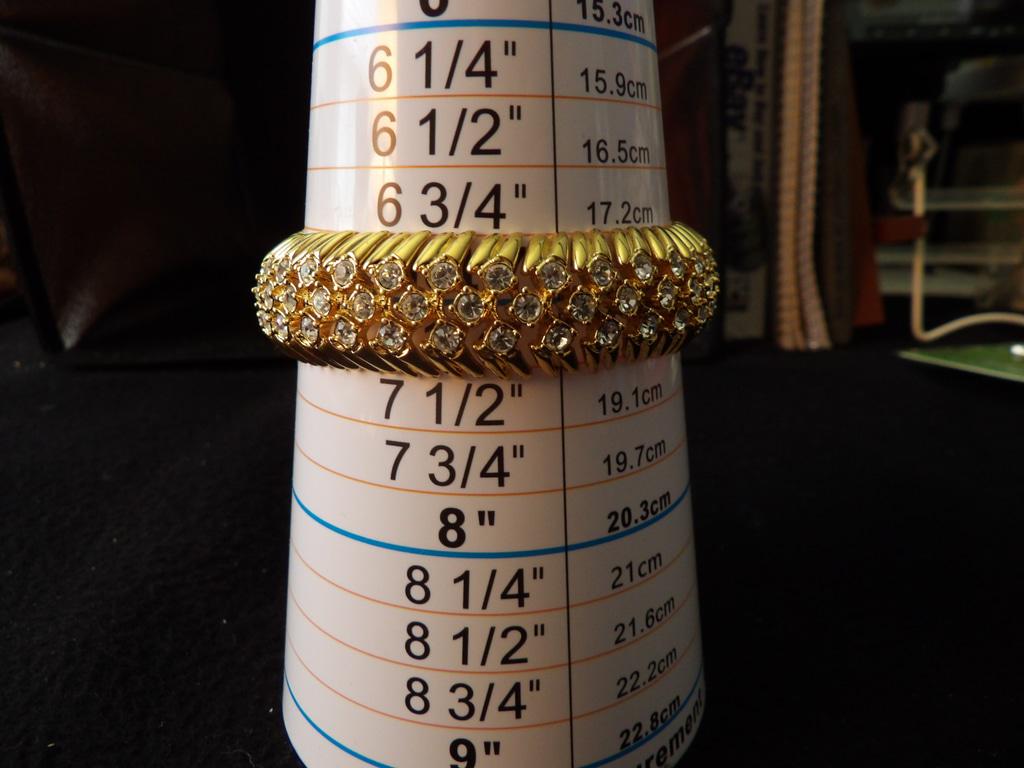 Joan Rivers Gold Tone Triple Row Clear Rhinestone Bracelet with Logo Clasp