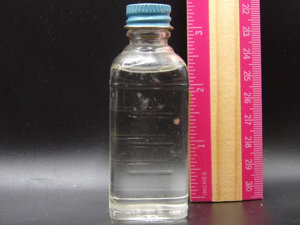 Vintage Johnson & Johnson Baby Oil Glass Bottle — 1¼ fl oz with Blue Metal Cap